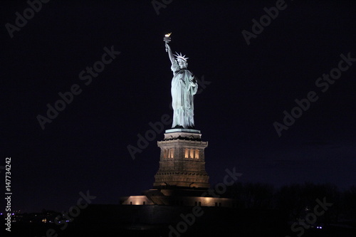 Statue of Liberty shining in the night