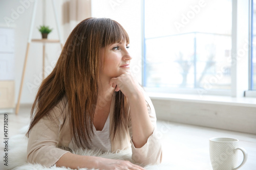 Beautiful mature woman rest...