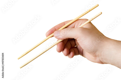 chopsticks in hand isolated