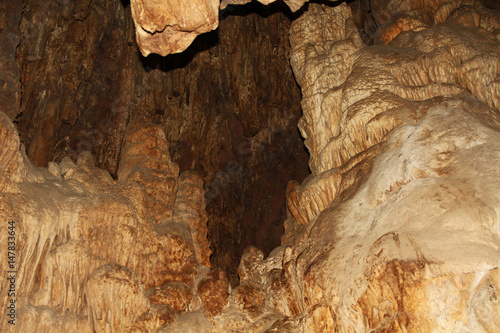 Fotografie Black copy space next to a rock formation inside the cave at Colossal Cave Mountain Park in Vail, Arizona, USA, near Tucson in the Sonoran Desert