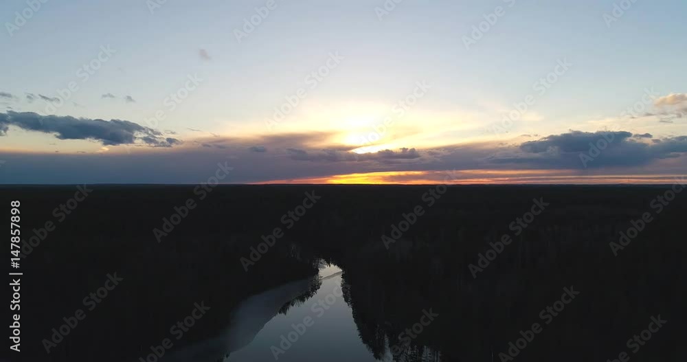 Haukkalampi, Cinema 4k aerial landing view of a sunset at haukkaampi pond, in nuuksio national park, on a sunny spring day, in Espoo, Finland Haukkalampi, Cinema 4k aerial landing view of a sunset at haukkaampi pond, in nuuksio national park, on a sunny spring day, in Espoo, Finland