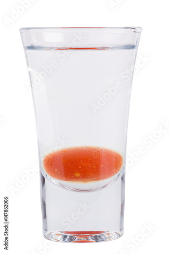 Shot. Alcoholic drink on a white background. photo