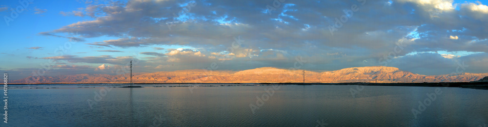 Sunset at the Dead Sea overlooking the mountains of Jordan