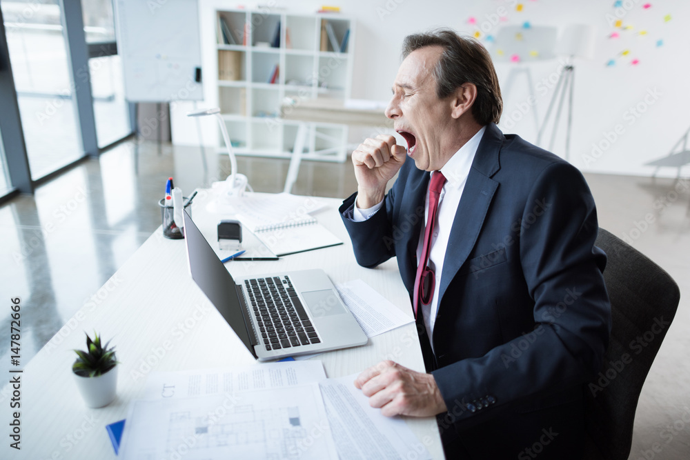 Fototapeta premium Mature businessman at workplace