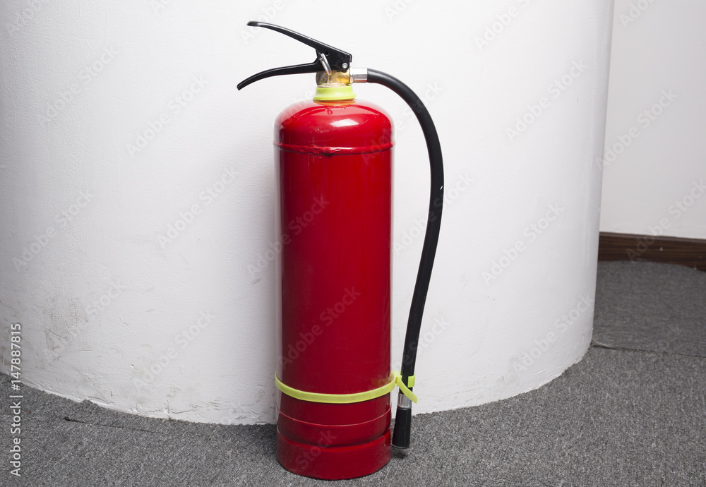 Obraz premium Fire extinguishers in the corner.