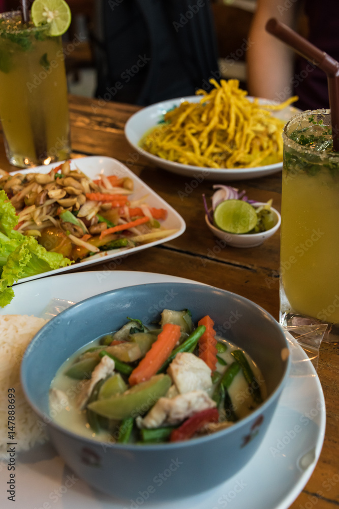 Typical thai food papaya salad, thai cocktail, curry Typical thai food papaya salad, thai cocktail, curry
