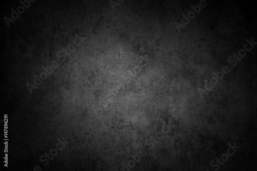 Black textured wall, dark edges background © Stillfx