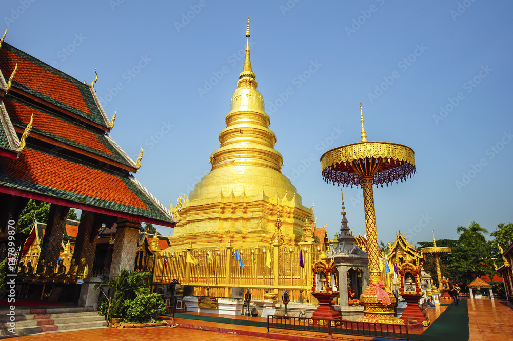 Fototapeta premium LAMPHUN-APRIL,21 :Wat Phra That Hariphunchai pagoda temple important religious traveling destination in northern province is the most famous temple.THAILAND APRIL,21 2017