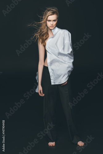 girl wearing white male shirt