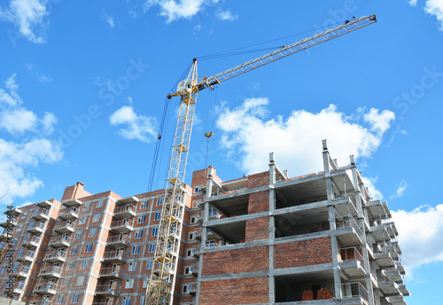 Crane Construction Site. Tower crane on industrial building construction.