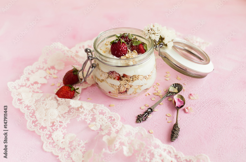 Oatmeal in a jar with strawberries and coconut Oatmeal in a jar with strawberries and coconut