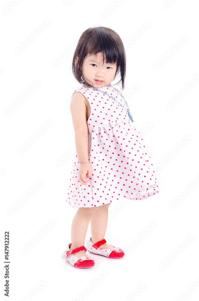 Little asian girl standing over white background Little asian girl standing over white background