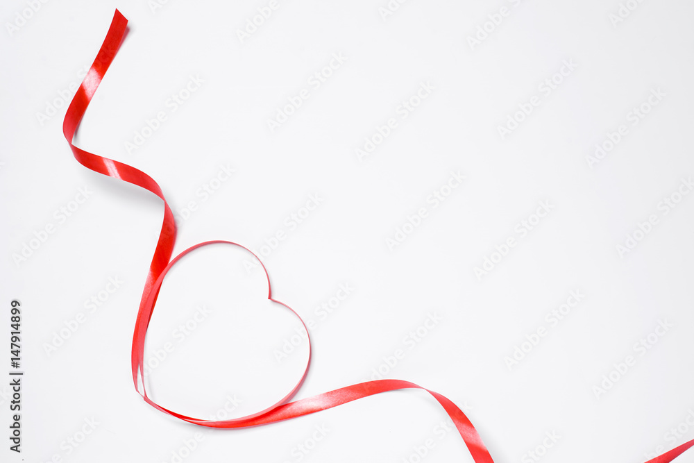 Festive red ribbon isolated on white background Festive red ribbon isolated on white background