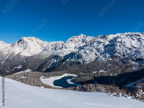 Winter landscape in Valmalenco - Palù lake and Group of Bernina