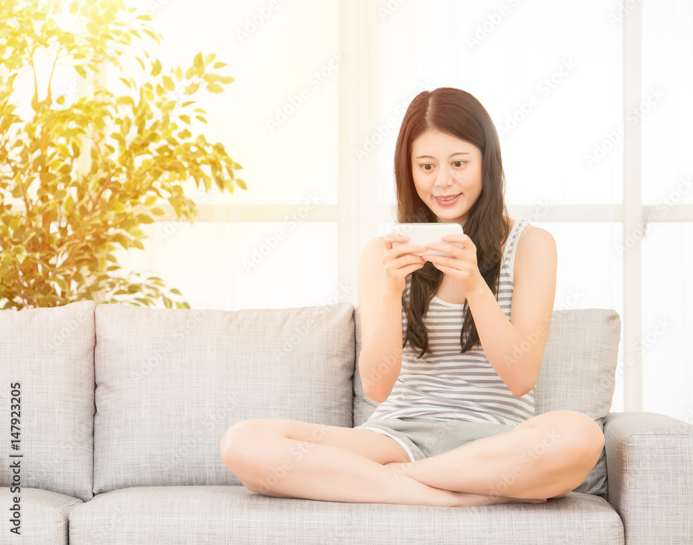 woman playing smartphone app game woman playing smartphone app game
