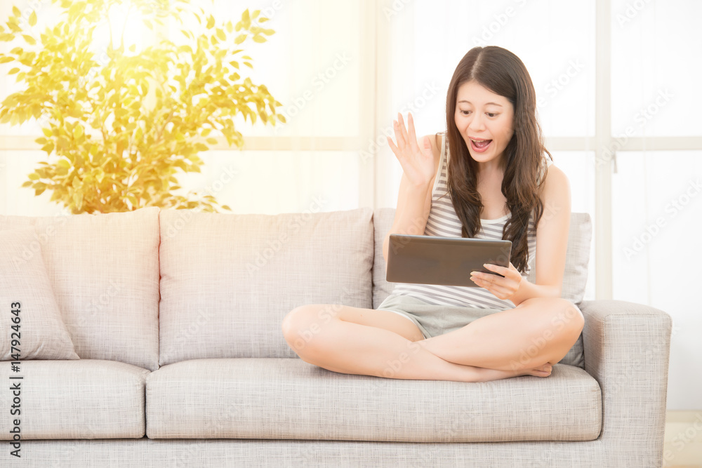 beautiful woman watching media content in a tablet beautiful woman watching media content in a tablet