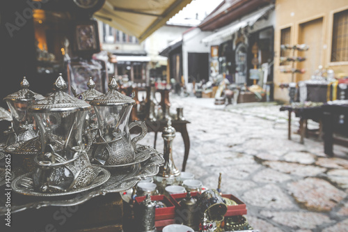 Copper product as souvenir for visitors and tourists in Old Town Sarajevo. Bosnia and Herzegovina. photo