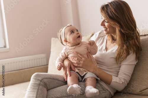 Billede på lærred Baby in mother's lap