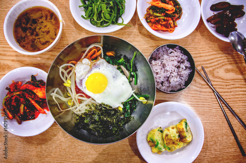 Traditional Korean dinner, a set of several dishes, with rice and kimchi. Shot from above