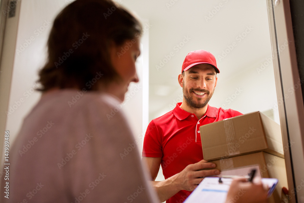 deliveryman and customer with parcel boxes at home deliveryman and customer with parcel boxes at home