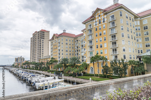 TAMPA - FEBRUARY 2016: City buildings in front of docked small boats. Tampa is a major destination in Florida