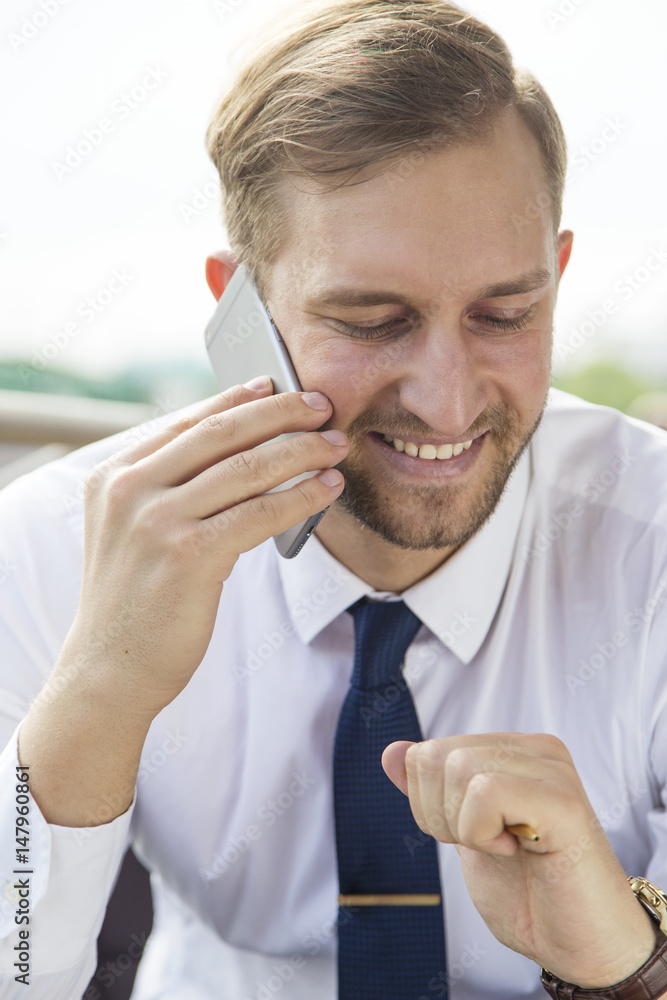Portrait of blonde business man talking on the phone Portrait of blonde business man talking on the phone
