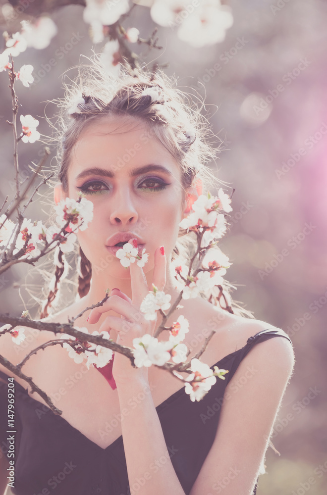 beautiful girl in spring park with flowers beautiful girl in spring park with flowers