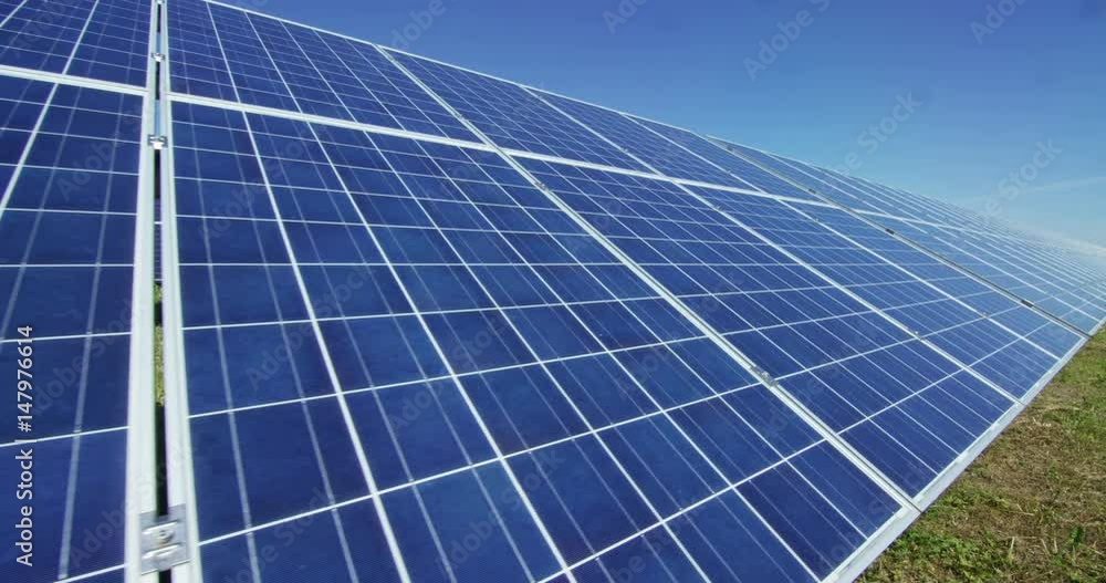 View close to the photovoltaic panel, using clean energy, renewable energy. The concept of remote support technology, bio ecology, ecology, electricity from sunlight, bio energy, solar panel design. View close to the photovoltaic panel, using clean energy, renewable energy. The concept of remote support technology, bio ecology, ecology, electricity from sunlight, bio energy, solar panel design.