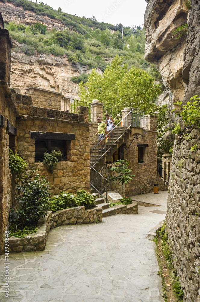 Cloudy view of monastery complex Sant Miquel del Fai not far from Barcelona, Catalonia, Spain.