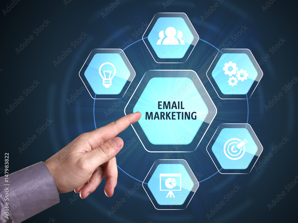 Business, Technology, Internet and network concept. Young businessman shows the word: Email marketing Business, Technology, Internet and network concept. Young businessman shows the word: Email marketing