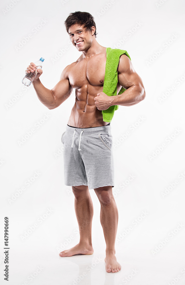 Naklejka premium Strong Athletic Man showing big biceps and abdominal muscles