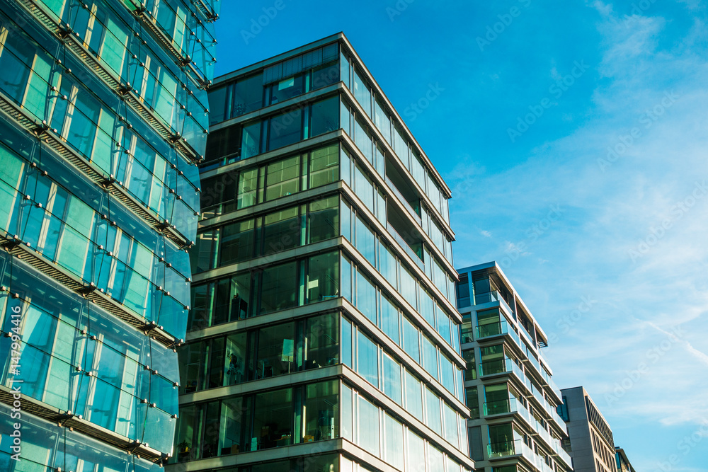 glass office buildings in a row glass office buildings in a row