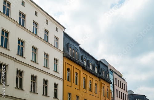 houses in a row on a cloudy day