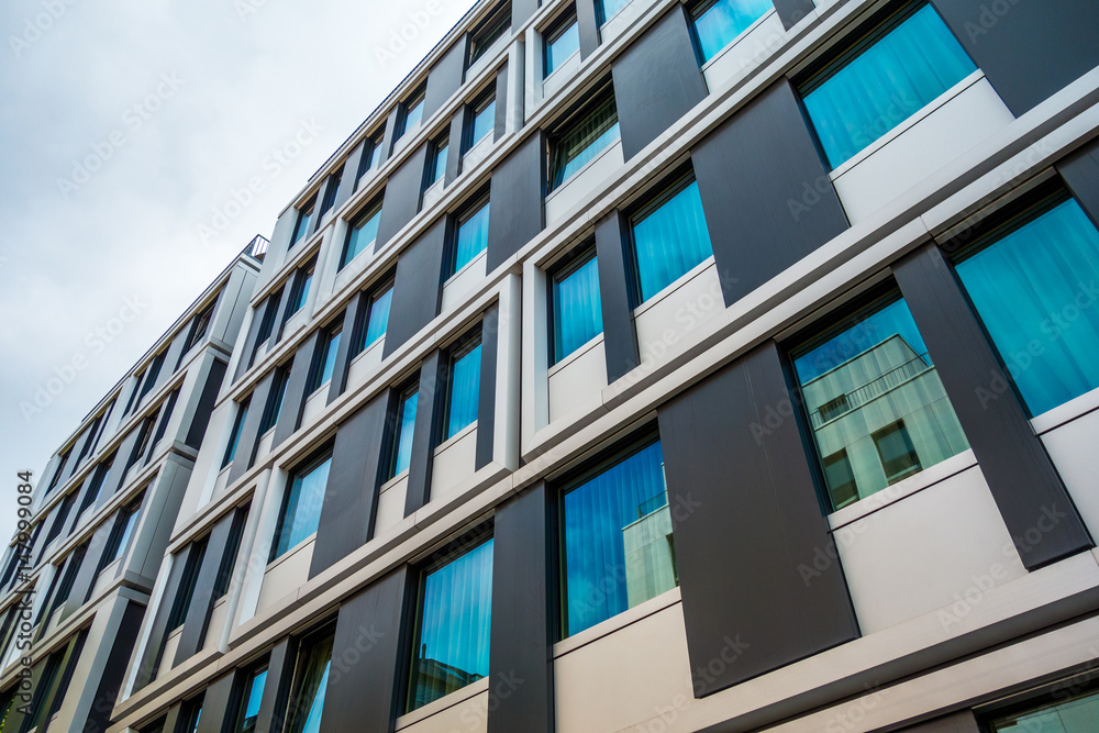 modern office facade with blue colored windows modern office facade with blue colored windows