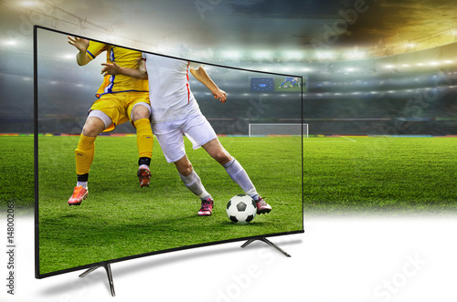 4k monitor watching smart tv translation of football game © Vitaly Krivosheev