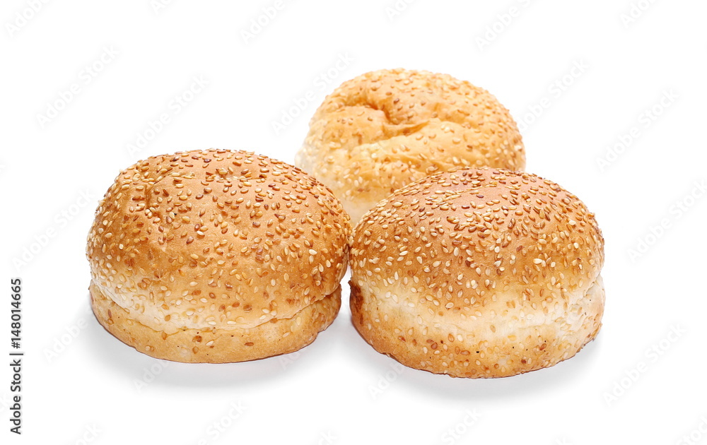 Three burger buns with sesame isolated on white background