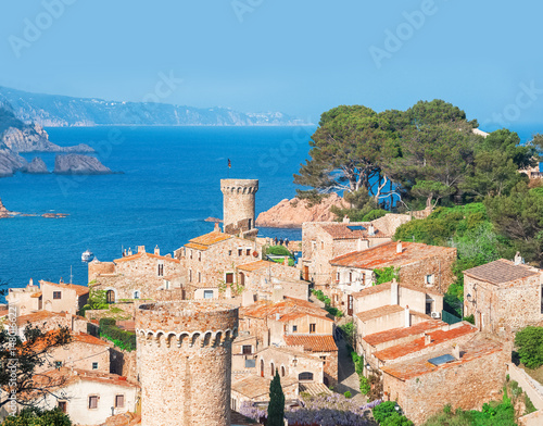 Spain. Catalunya. Tossa de Mar. Aerial and panoramic view of Fortress Vila Vella and Badia de Tossa on the Costa Brava. Azure sea. Sightseeing tour in Spain.
