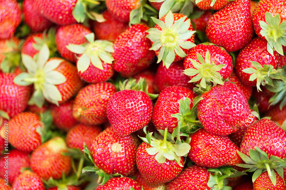 Background for design from ripe red strawberry Background for design from ripe red strawberry