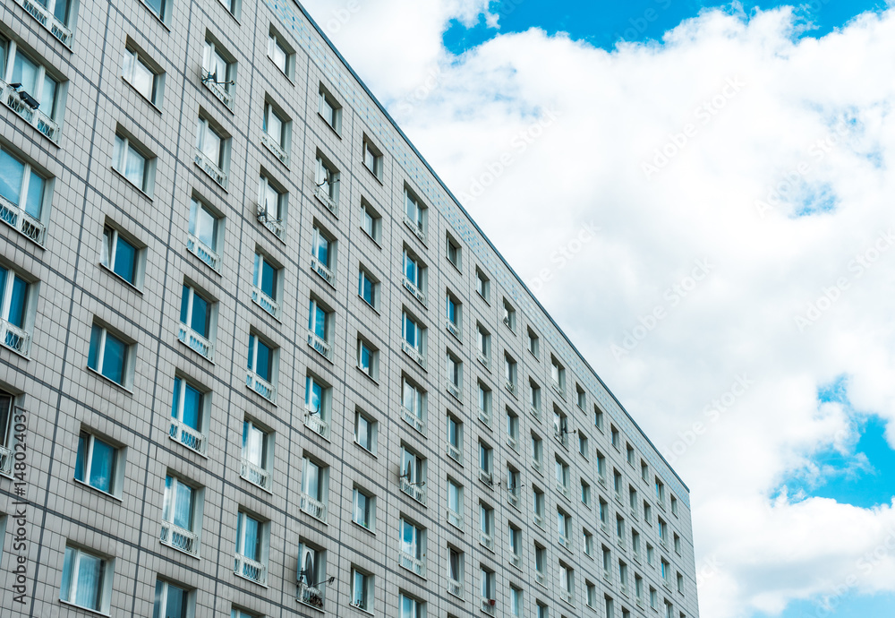 typical Berlin plattenbau building with clouds in the background typical Berlin plattenbau building with clouds in the background