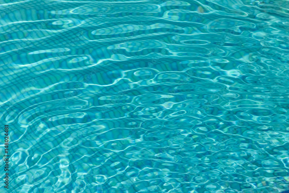 Surface of the water in the pool. Texture of the water