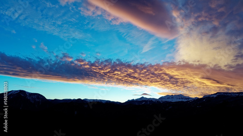 Lenticular (lens-shaped) clouds after sunset. Caucasus. Russia. The Caucasian reserve. Plateau of Lagonaki