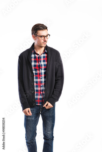 Handsome man in checked shirt, studio shot, isolated