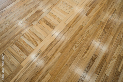 Wooden parquet floor in hall.