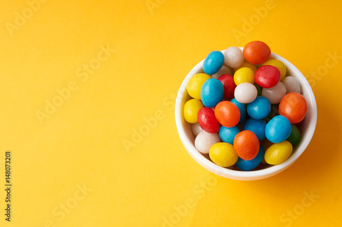 candy colored balls in a bowl