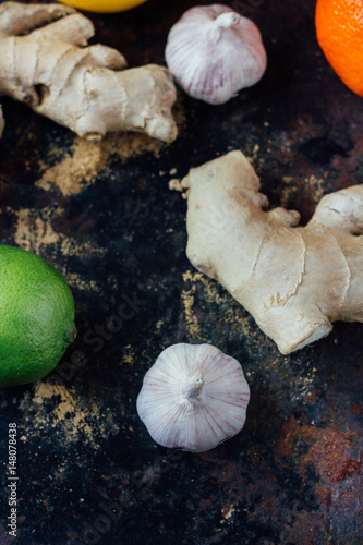 Citrus fruits with garlic and ginger root