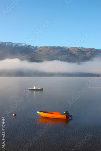 Norway lake with fog and mountains