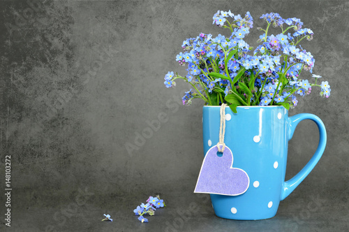 Fathers Day and Mothers Day flowers on dark grunge background