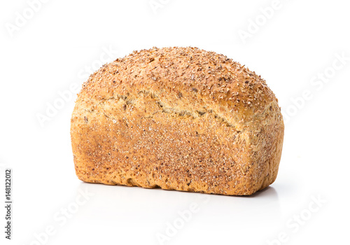 Loaf of wholegrain bread over white