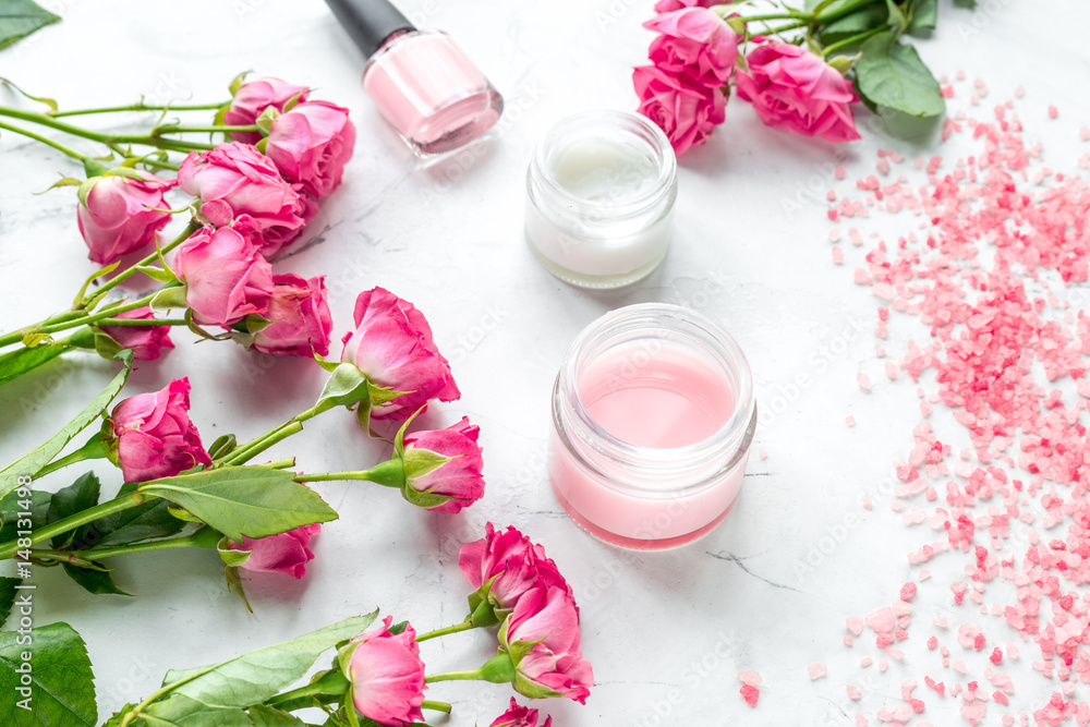 organic cosmetic with rose cream and petals on white background organic cosmetic with rose cream and petals on white background