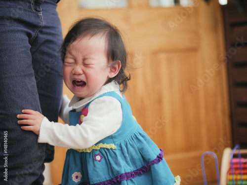 Canvas Print crying baby girl at home